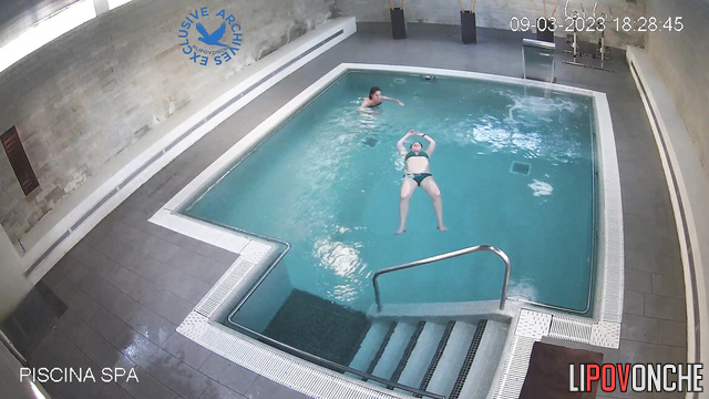 Swimming people were filmed in a public pool, look