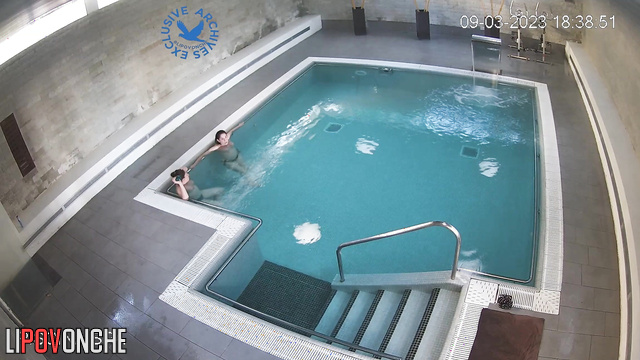 Swimming people were filmed in a public pool, look