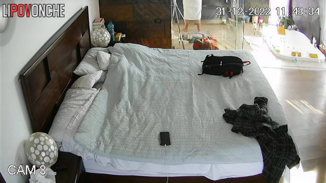 Preparation of married couple before the New Year in bathroom