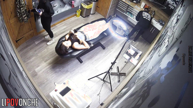 Video from tattoo salon from hidden video camera showing nice angle